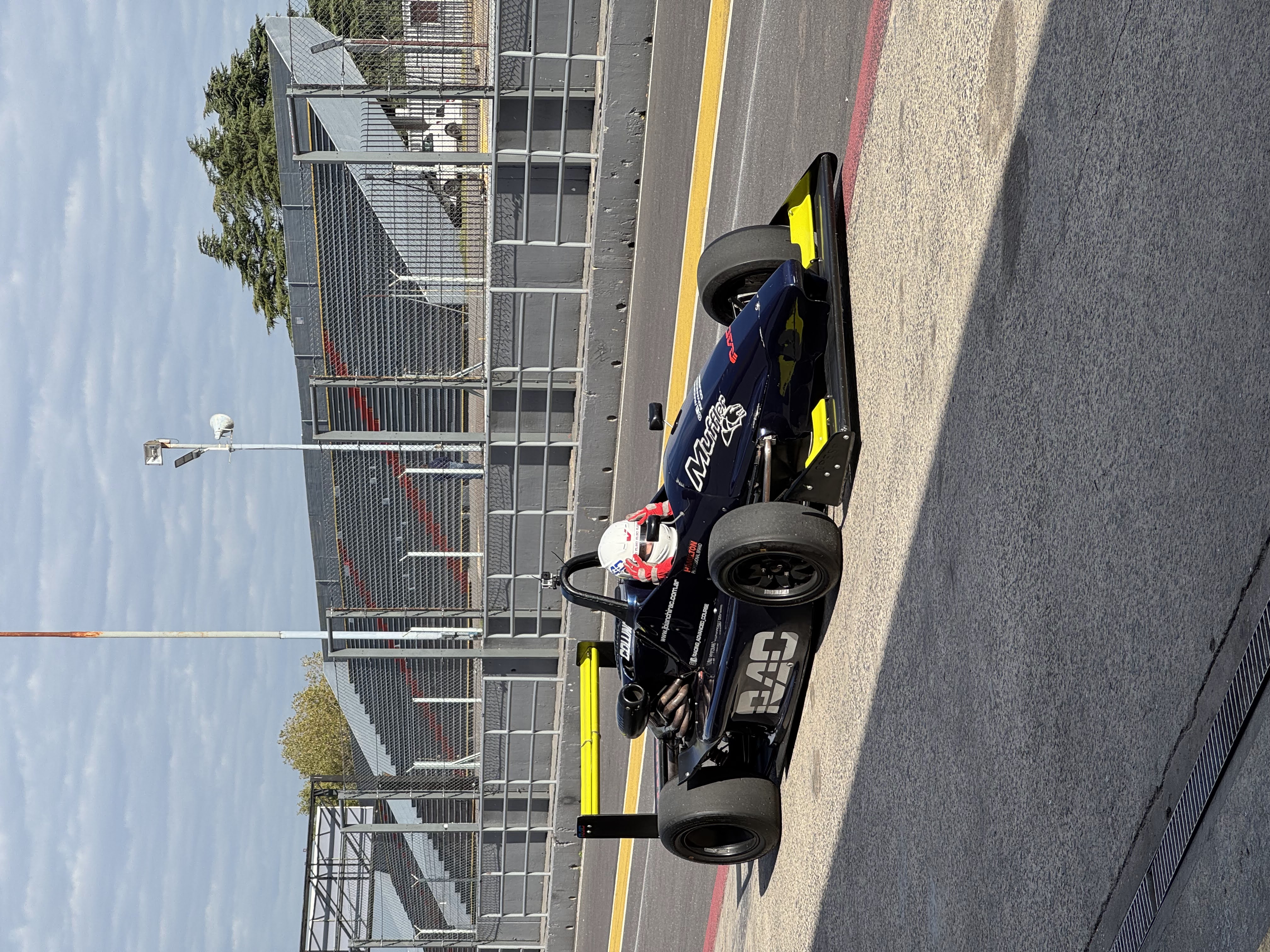 Formula 4 car on track at Juan y Oscar Galvez circuit